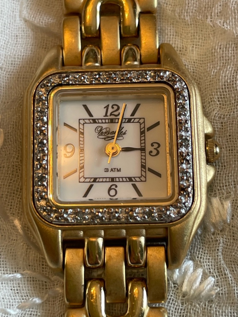 Versailles Gold Tone Women's Crystal Bezel Link Watch with White Dial. 7”.